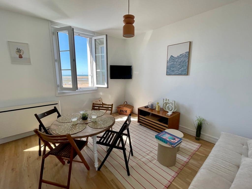Sea view from the living room of Au Soleil Couchant apartment in Houlgate